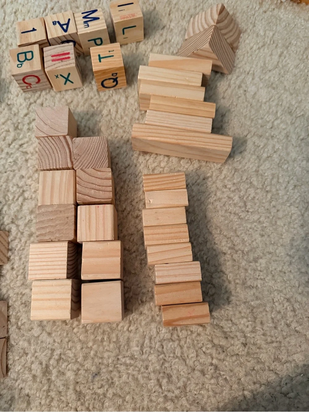 Plain wooden block set, approximately 50 blocks